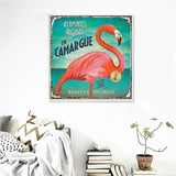 vintage pink flamingo hanging on the wall